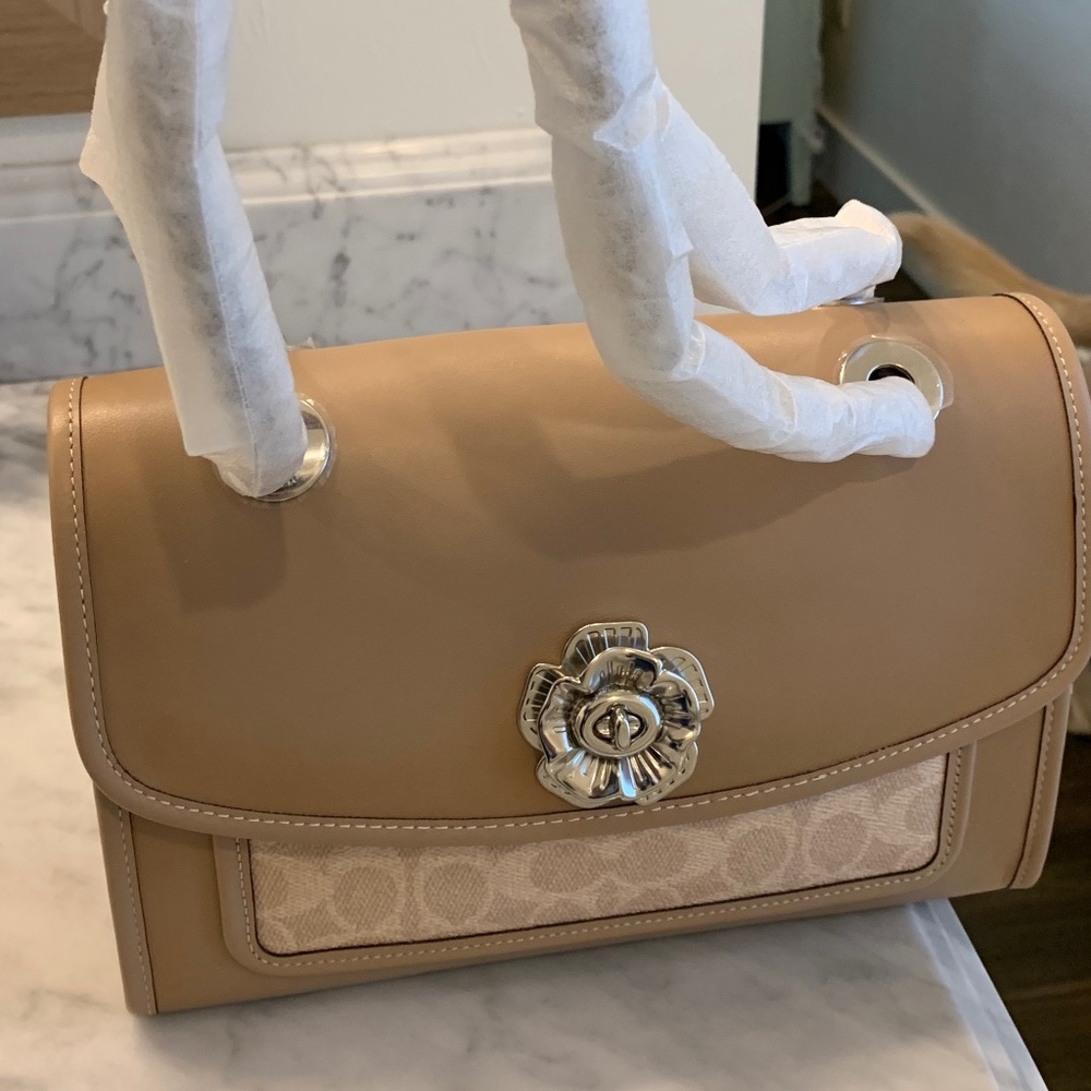 NWT coach purse with flower closure nude silver